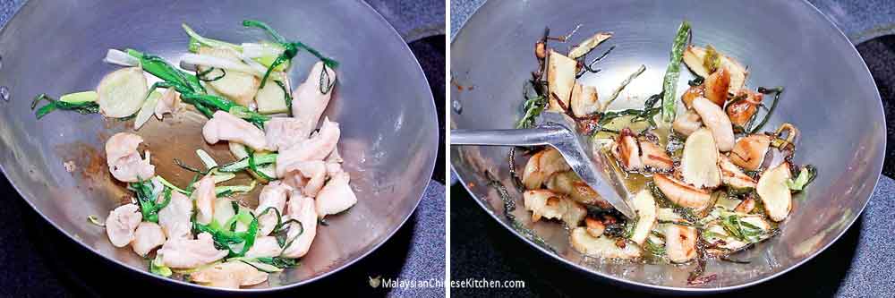 Seasoning the wok the traditional way using pork lard and aromatic herbs and vegetables.