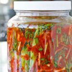 Freshly made Mustard Green Kimchi (Gat Kimchi) in a jar.