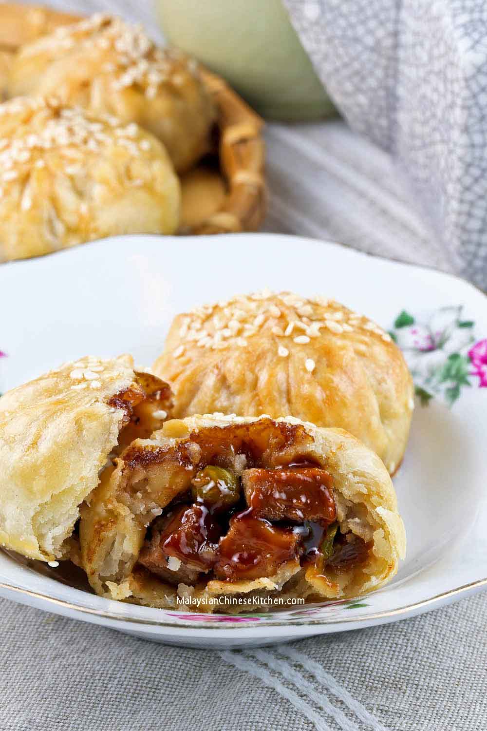 Seremban Siew Pau (Baked BBQ Buns) with a moist char siu filling.